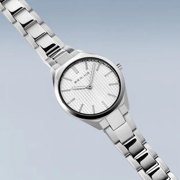 Ladies Ultra Slim Stainless Steel w/ Silver Waffle Sunray Dial and Stainless Steel Strap