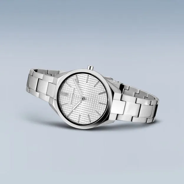 Ladies Ultra Slim Stainless Steel w/ Silver Waffle Sunray Dial and Stainless Steel Strap